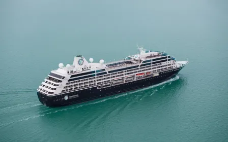 Azamara Quest cruise ship at anchor near port aerial view